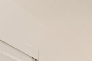 One-Bedroom Apartments in Lake Oswego, OR - Westlake Meadows - Bedroom with Double Nightstands, Wall Art, and Grey Accent Wall